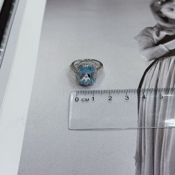 Silver ring with a 6.507-carat topaz and cubic zirconia