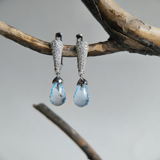 Silver earrings with a 9.483 ct topaz and cubic zirconia