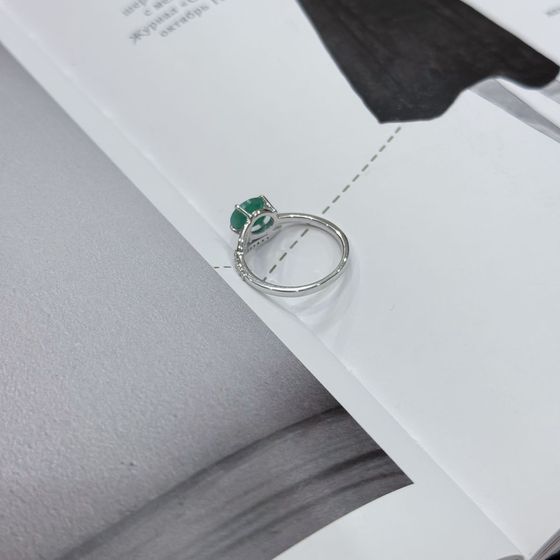 Silver ring with emerald, fianites