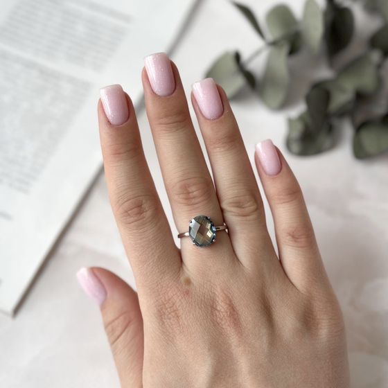 Silver ring with a mystic topaz