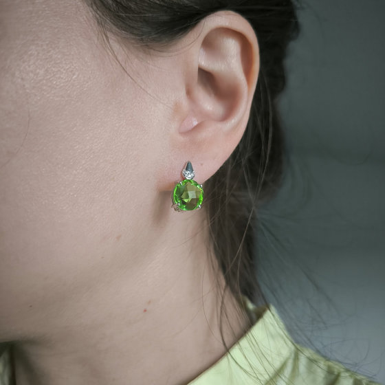 Silver earrings with a 6.685-carat chrysolite and cubic zirconia