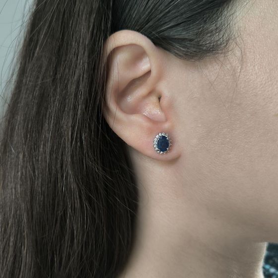 Silver earrings with a 2.237-carat sapphire and cubic zirconia