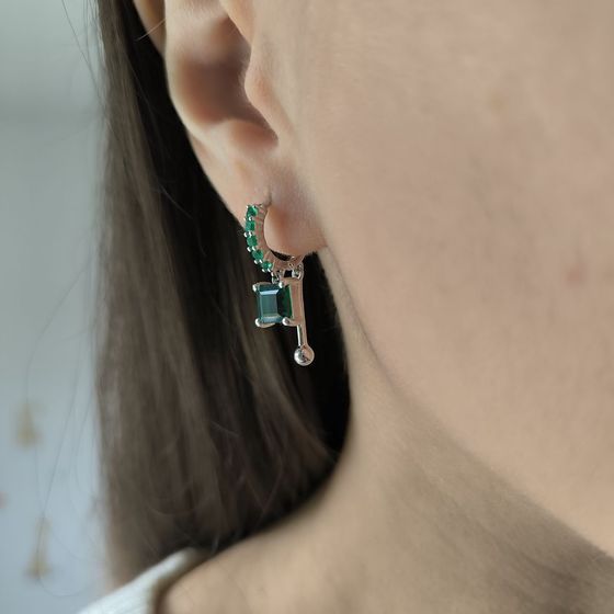 Silver earrings with a 2.295-carat nano emerald