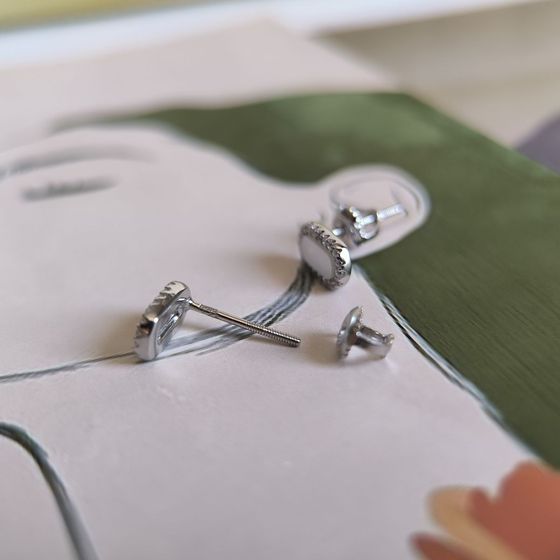 Silver earrings with mother-of-pearl, fianites
