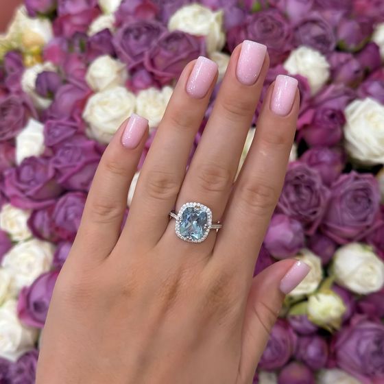 Silver ring with a 6.507-carat topaz and cubic zirconia