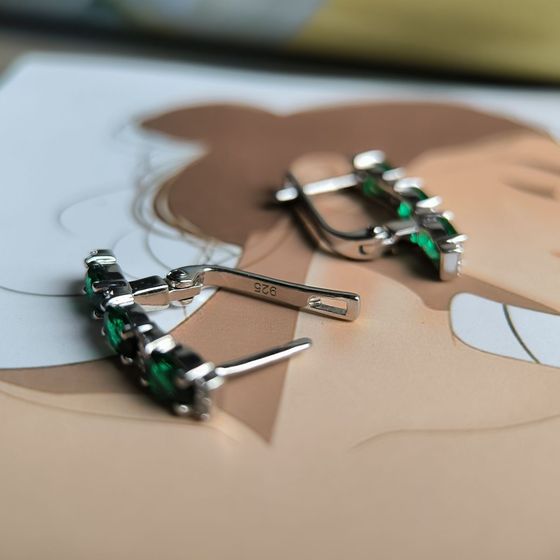 Silver earrings with a 2.114-carat nano emerald