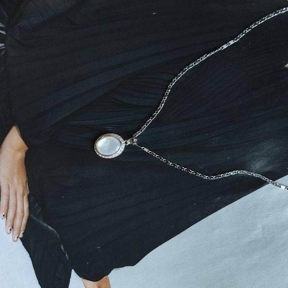 Silver pendant with phianites, mother-of-pearl