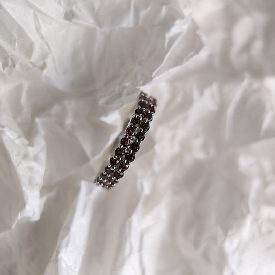 Silver ring with a garnet