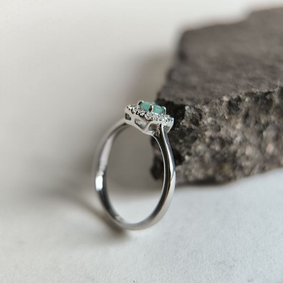 Silver ring with a 0.36-carat emerald and cubic zirconia