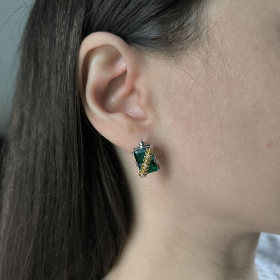 Silver earrings with a 5.963-carat nano emerald