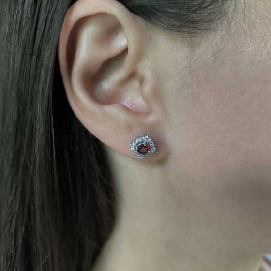 Silver earrings with a 0.949-carat garnet and cubic zirconia