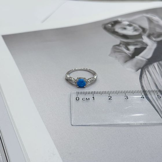 Silver ring with opal and cubic zirconia