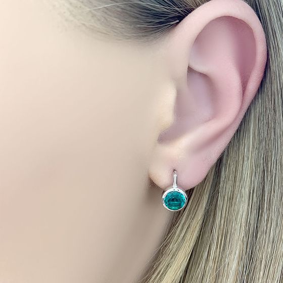 Silver earrings with a 1.225-carat nano emerald