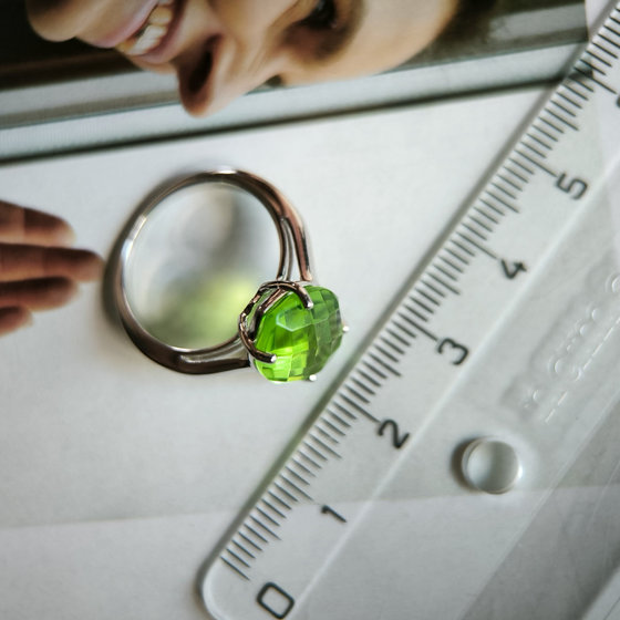Silver ring with a 4.855-carat chrysolite