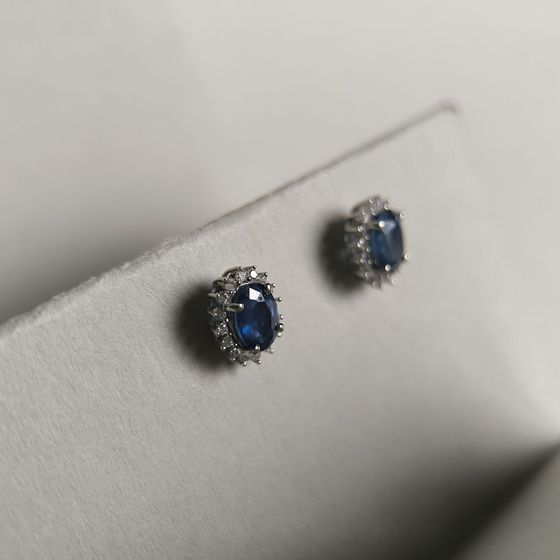 Silver earrings with a 2.237-carat sapphire and cubic zirconia