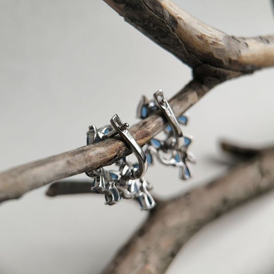 Silver earrings with a 4.31-carat nano sapphire