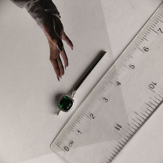 Silver pendant with a 0.95-carat nano emerald