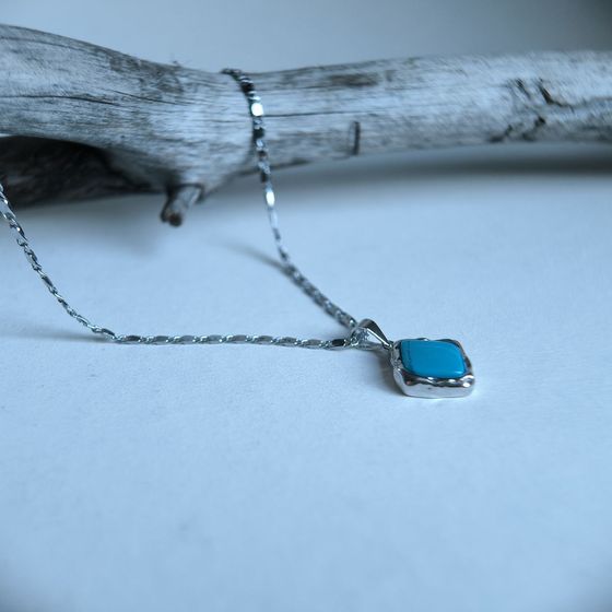 Silver pendant with turquoise