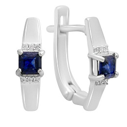 Silver earrings with a 0.889-carat sapphire and cubic zirconia